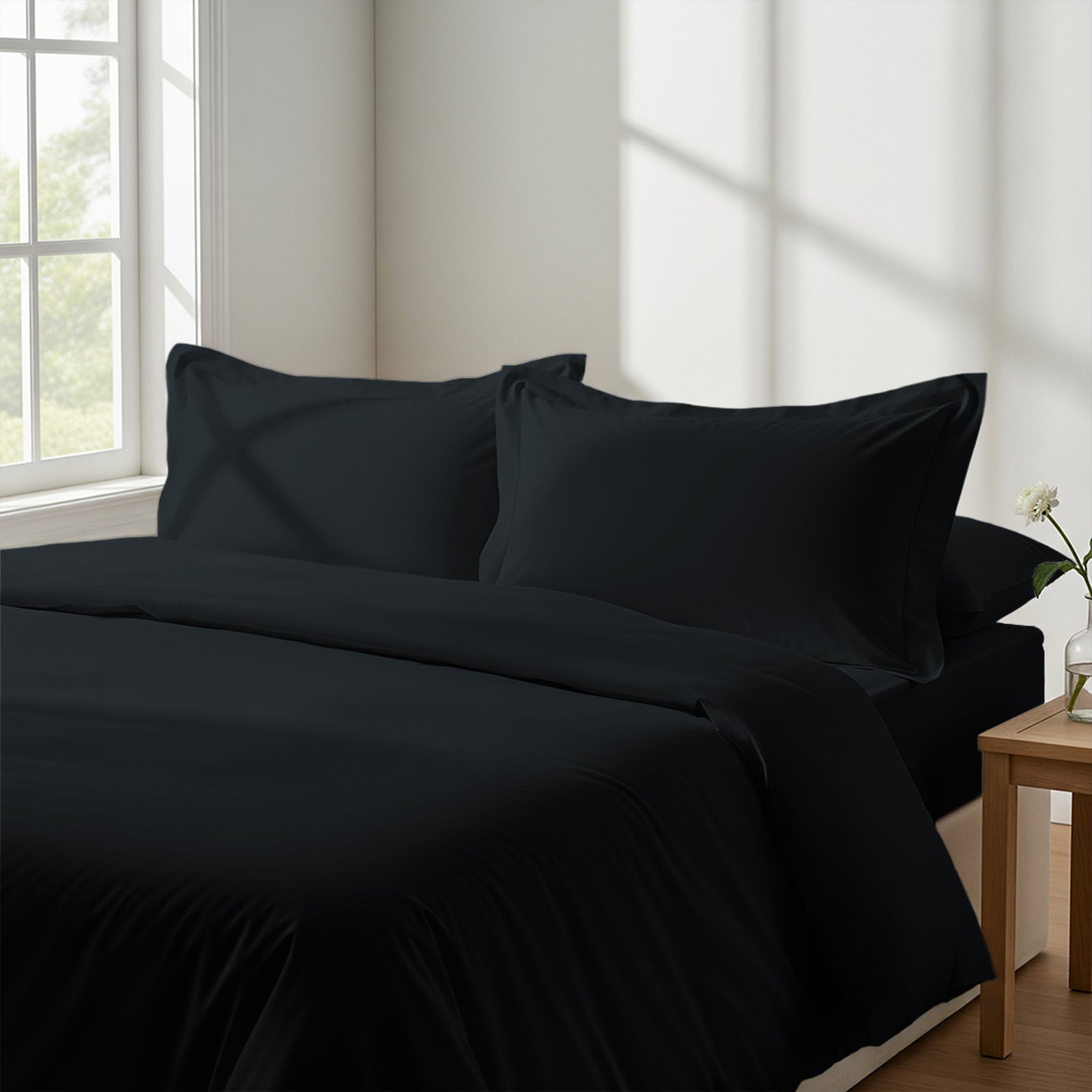 Calm luxurious bedroom bed with Black Pizuna Linens cotton duvet cover super king size
